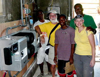 Photo of SLP team with EGO partners near generator
