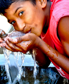 Photo of Nicaraguan boy drinking clean water