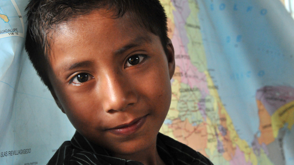 Mexico - Boy in front of map