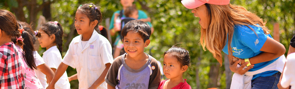 Honduras - Jenny laughs with kids at school in Yamaranguila