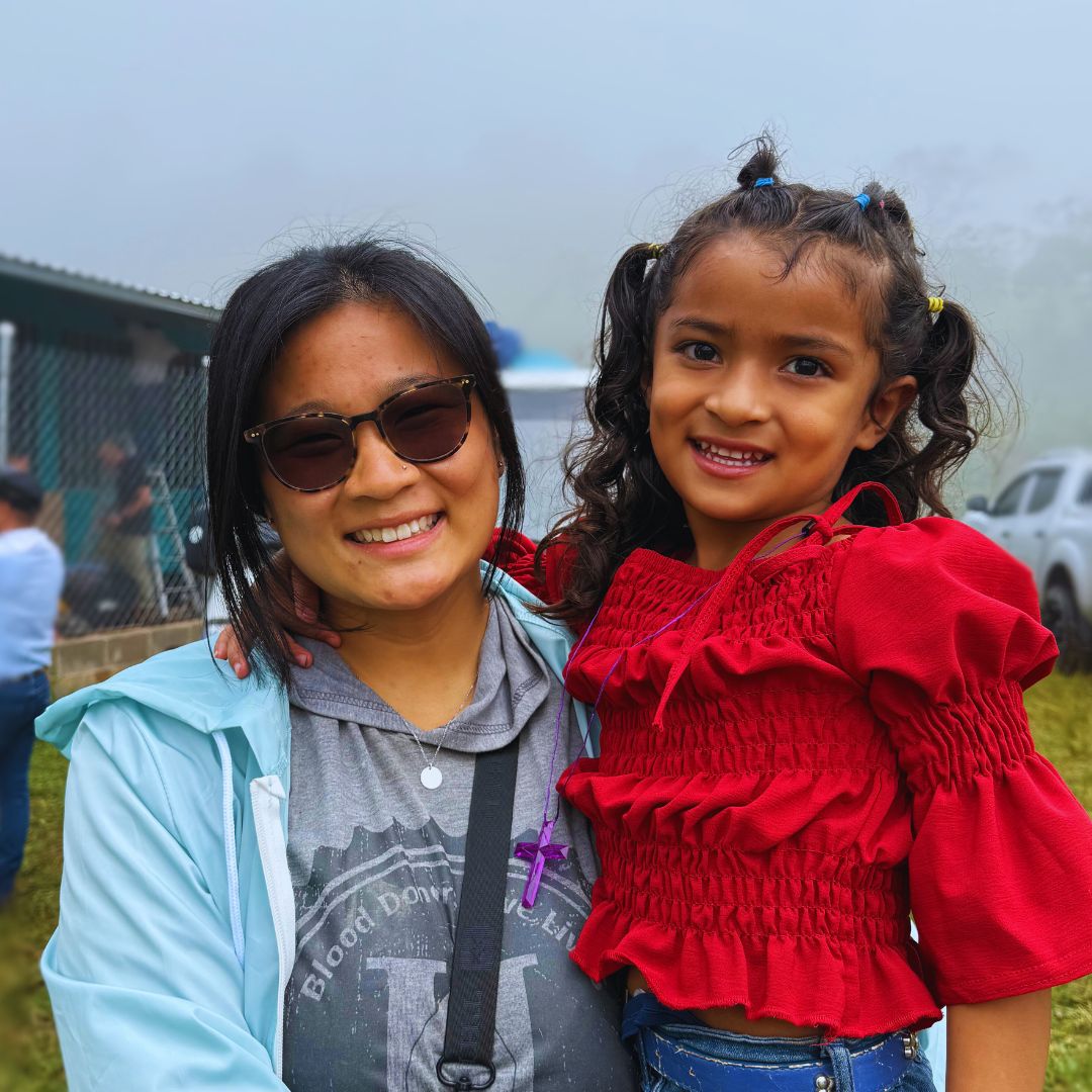 Elizabeth Mock with girl in red Honduras