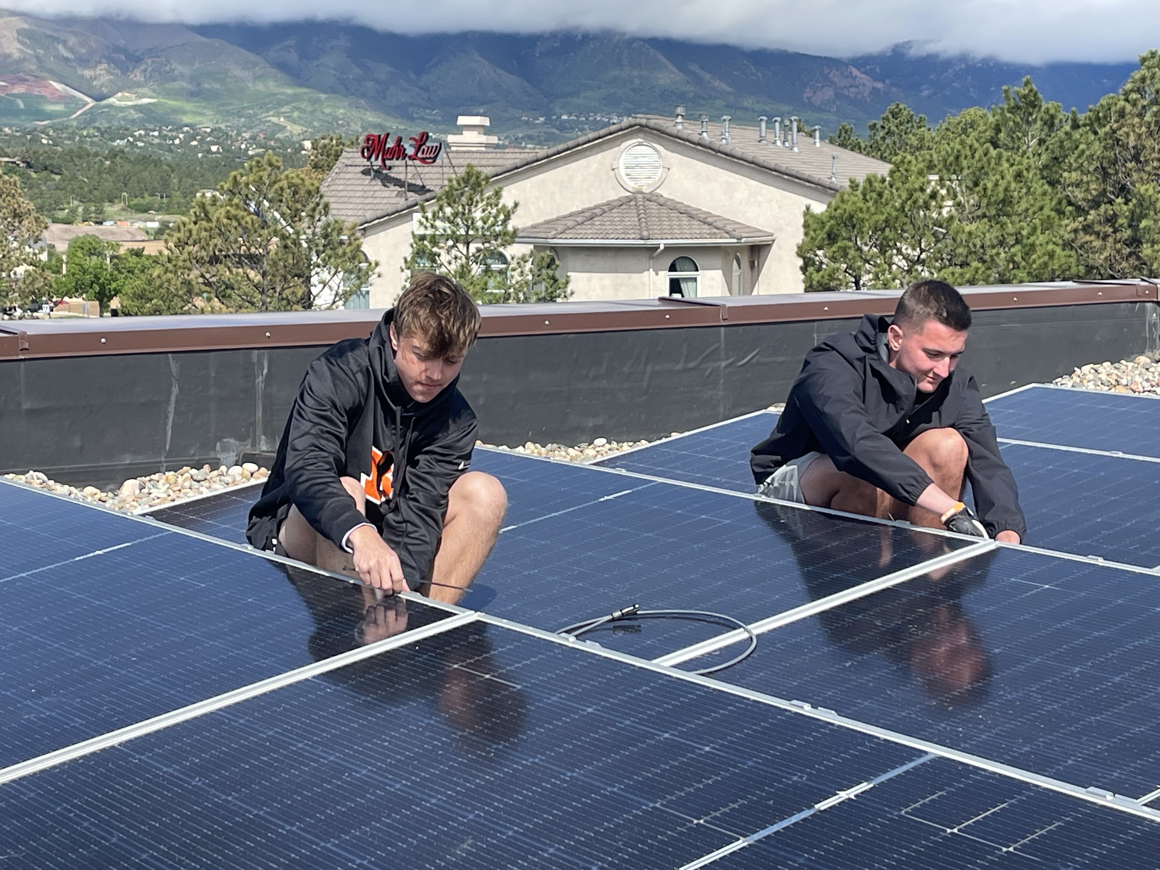 St x Blog Noah and Max squatting by panels